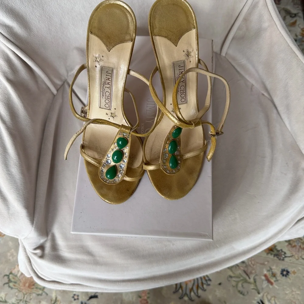 JIMMY CHOO Metallic Gold Strappy Stiletto Sandals with Green accents. Size 8.5